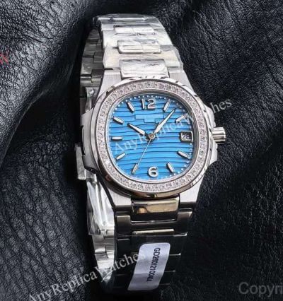 RRR Factory Patek Philippe Nautilus Cal.E 23-250SC Movement 32mm Blue Embossed Wave Pattern Face Women Watch
